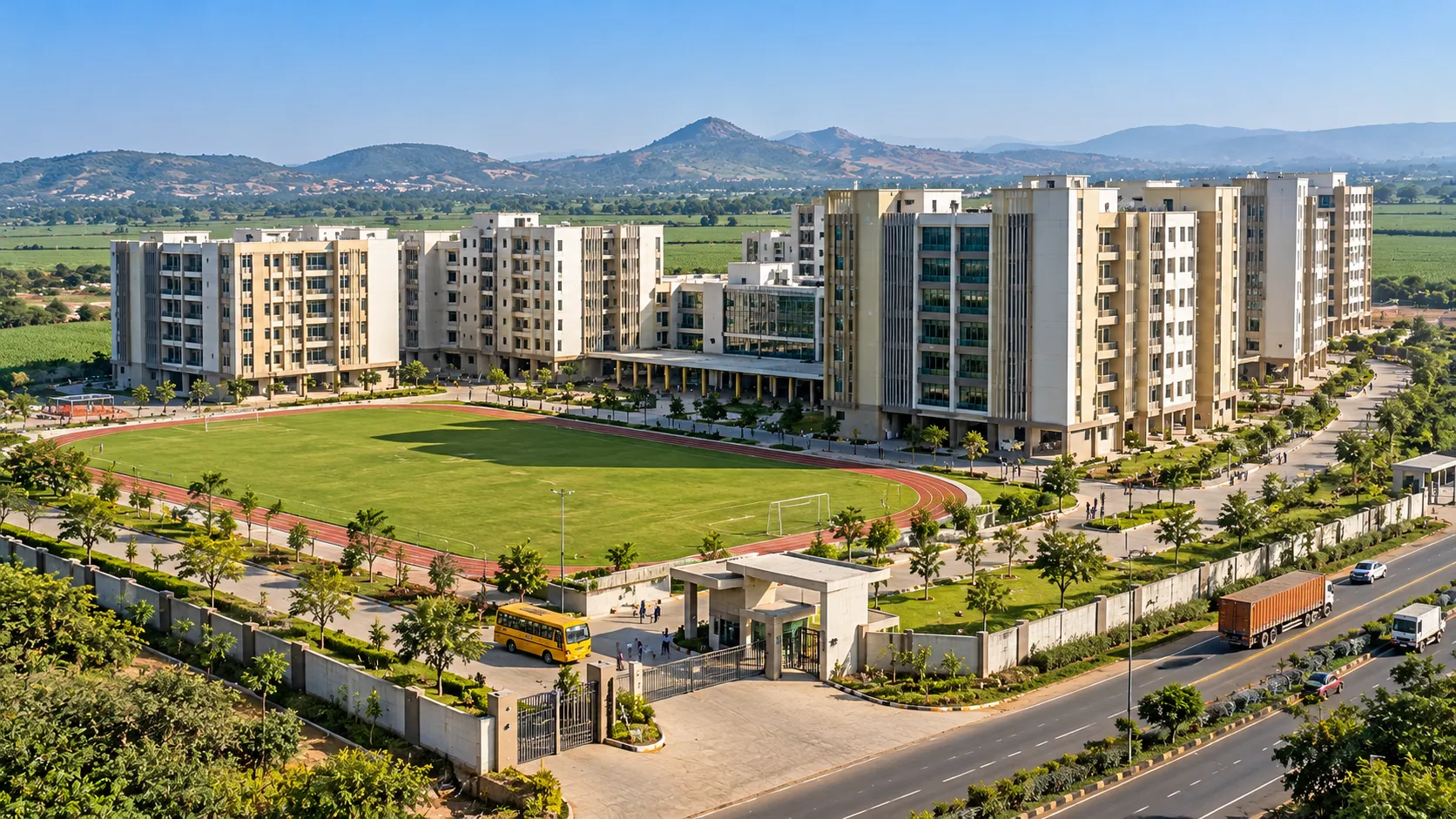 Illustrative render of a college campus of cream multi-storey buildings around a green playground with a running track, a gated entrance with a school bus, a highway with trucks alongside, and sugarcane fields and hills behind